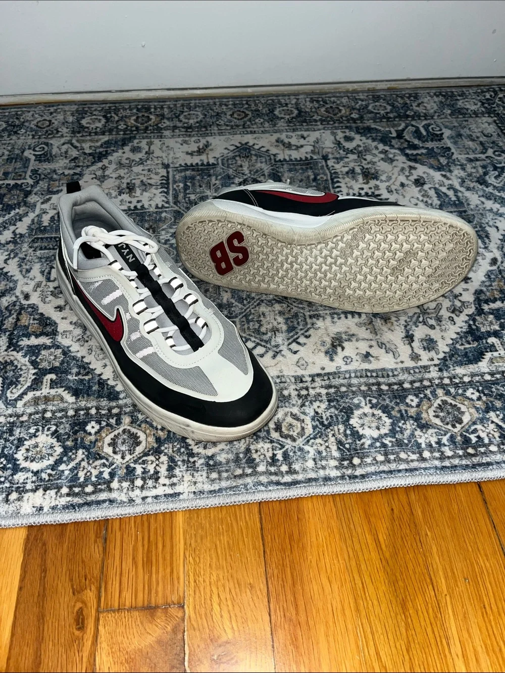 Nike Men’s Black, Gray and Red Skate Sneakers
